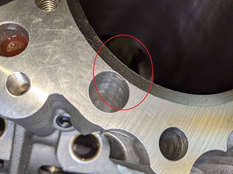 Attached picture Exhaust pushrod hole #8.jpg